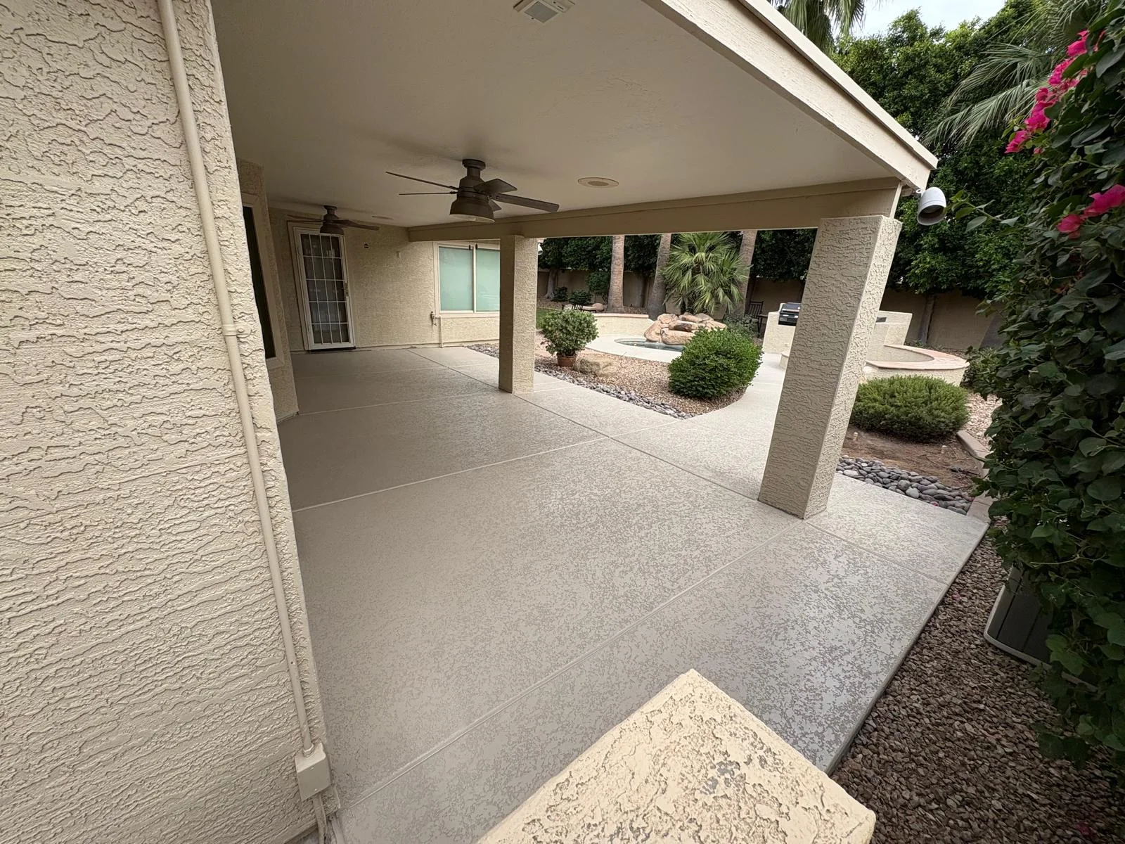 Finished covered concrete patio with decorative surface texture